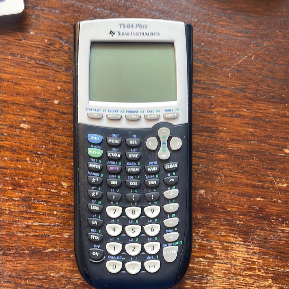 Texas Instruments TI-84 Plus Graphing Calculator in Black and White